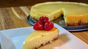 Bourbon Glazed Vanilla Cheesecake with Talon Raspberries